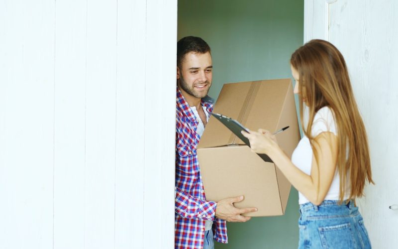 Person receiving a service visit at their front door